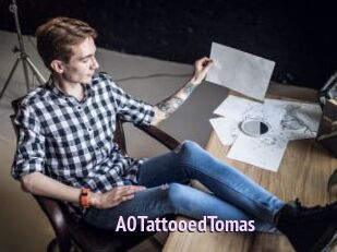 A0TattooedTomas